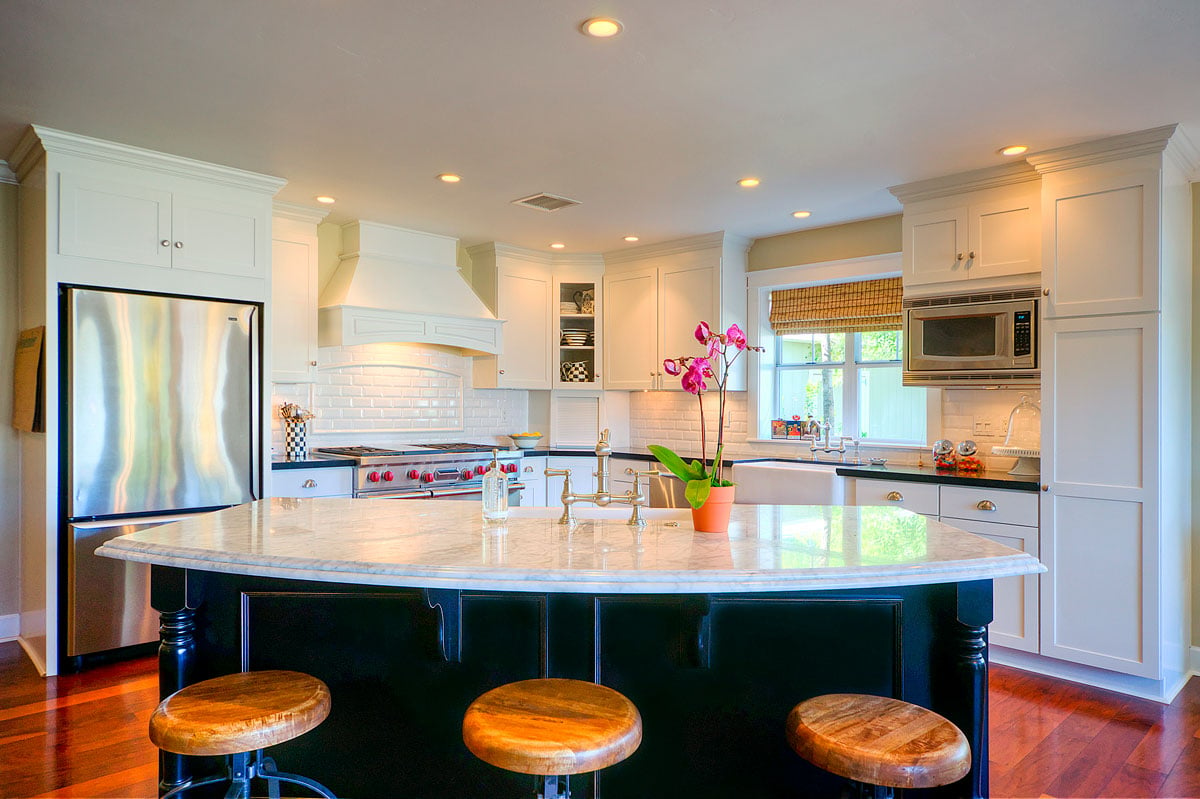 Kitchen island with wooden barstools