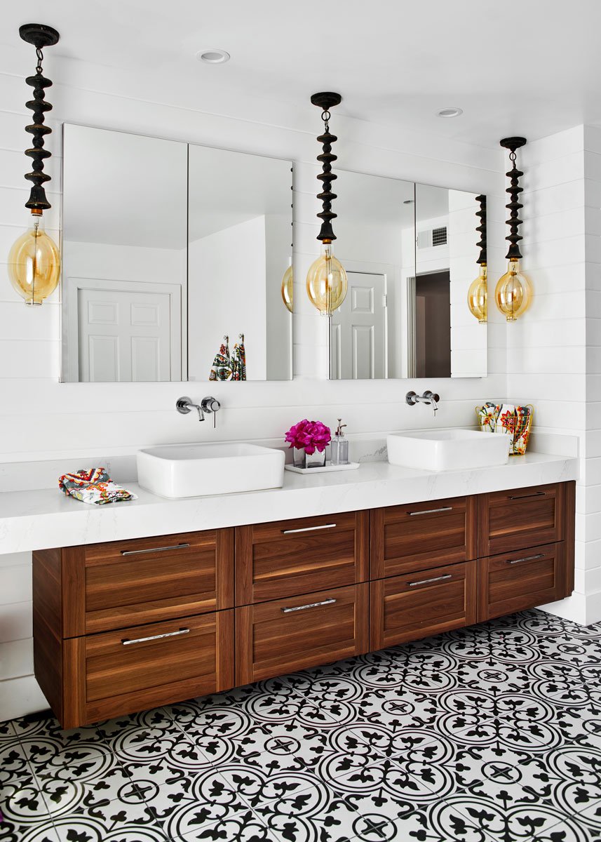 Contemporary master bathroom with double vanity and floating cabinetry