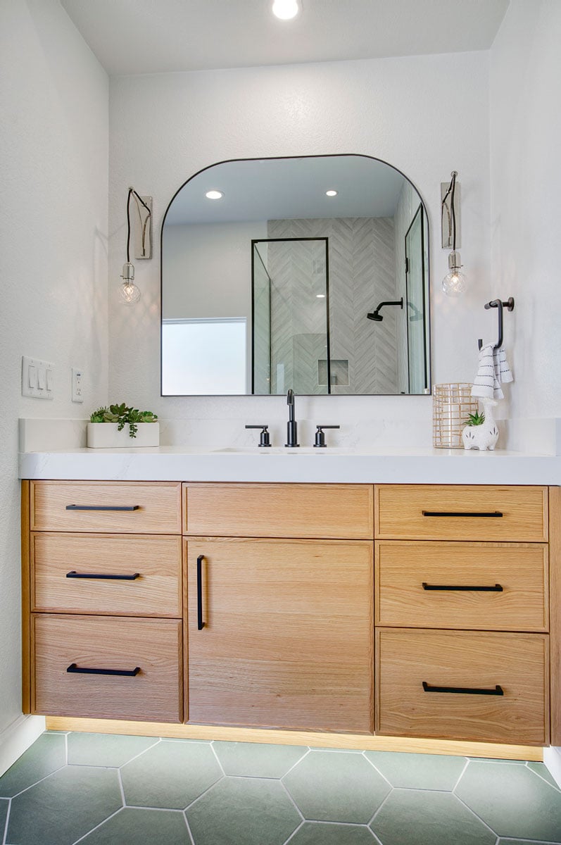 floating bathroom drawers and single mirror vanity