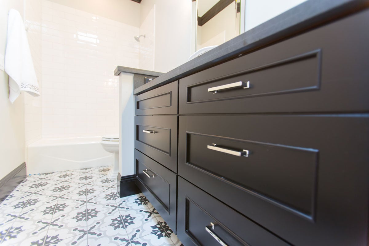 close up of bathroom countertop drawers and storage