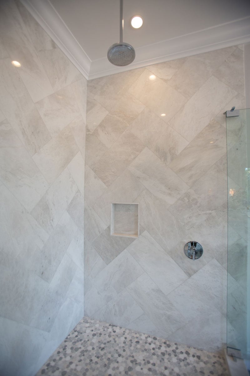 Walk In Shower Interior with Diagonal shower tiling