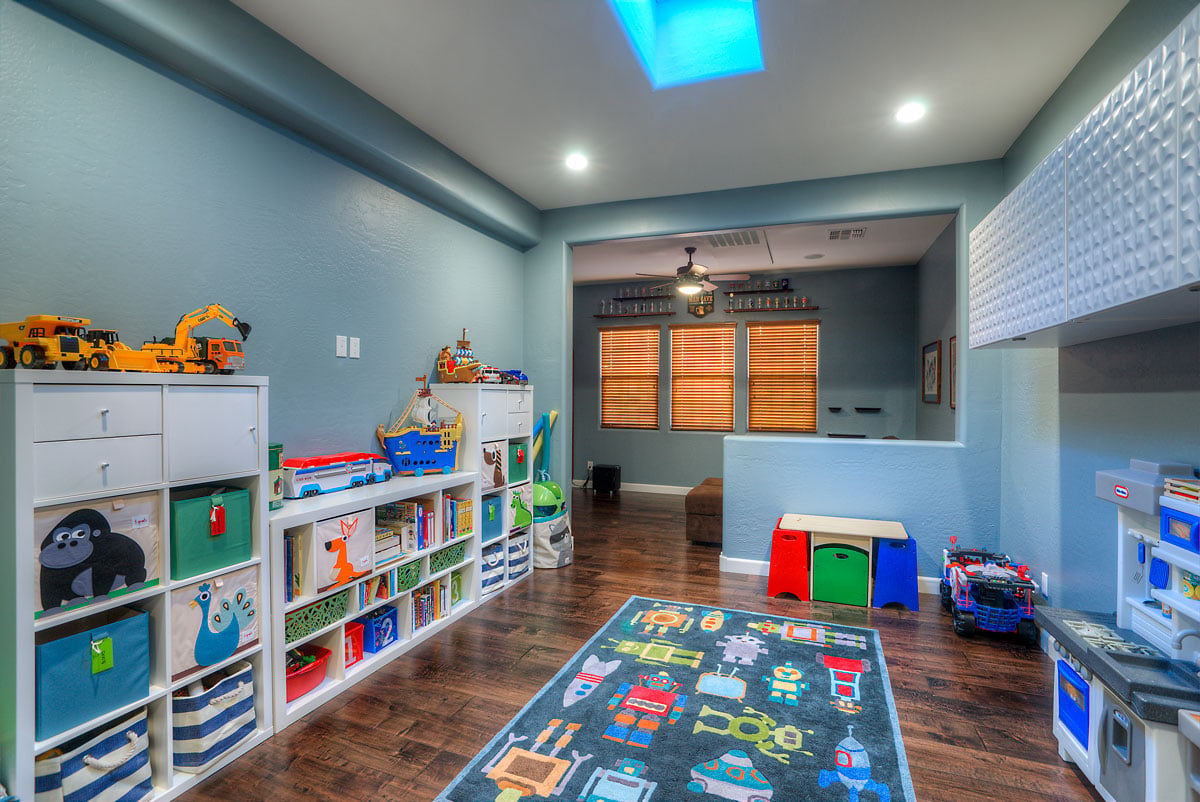 Scottsdale Transitional Home Kids Room With Vibrant Colored Toys