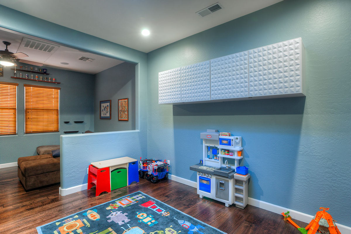 Scottsdale Transitional Home Playroom With White Storage